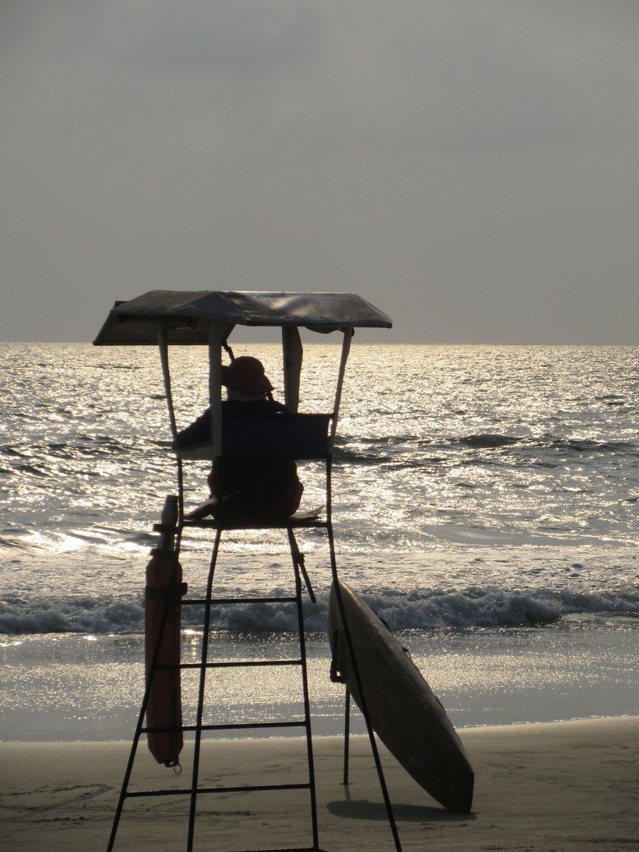 Lifeguard tower on a Goan beach at sunset