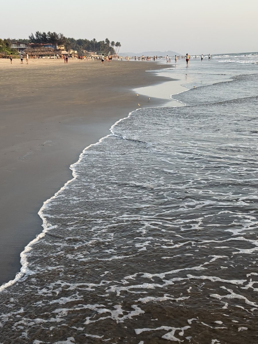 Waves rolling on Goan beach shore